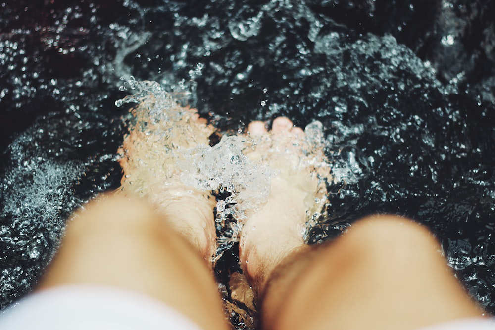 walking around barefoot in public pools may cause toenail fungus
